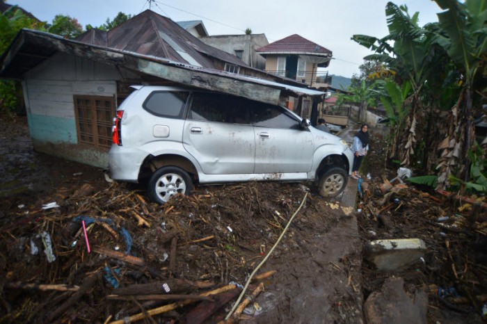 Death toll in Indonesia's lava floods rises to 67 with 20 missing