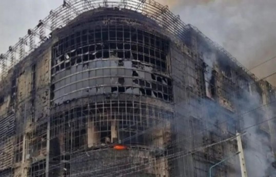Fire at a shopping center in Iran kills 11 people and injures 26